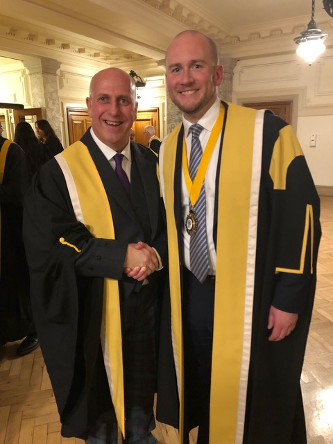 Dr Scott Mackie with College of Optometrists president Leon Davies
